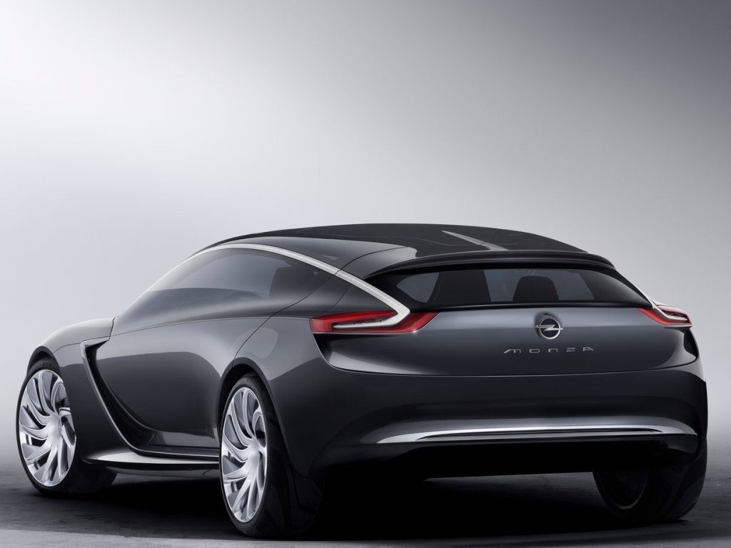 Opel Monza CNG koncepcyjny pojazd hybrydowy widok boczny z drzwiami